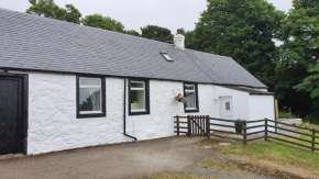 New cosy cottage with sea views